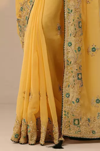 yellow embroidered chinon saree with unstitched blouse piece
