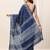 blue geometric printed saree with blouse piece