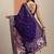 purple printed georgette saree with unstitched blouse piece