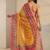 yellow tribal printed tassel saree with unstitched blouse piece