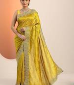 yellow embroidered saree with unstitched blouse piece