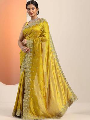 yellow embroidered saree with unstitched blouse piece 2