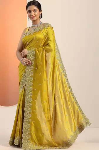 yellow embroidered saree with unstitched blouse piece