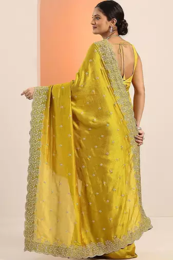 yellow embroidered saree with unstitched blouse piece