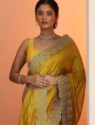yellow embroidered saree with unstitched blouse piece 4