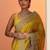 yellow embroidered saree with unstitched blouse piece