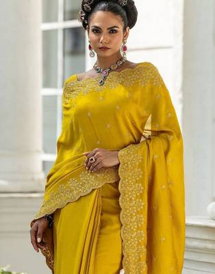 yellow embroidered saree with unstitched blouse piece 5