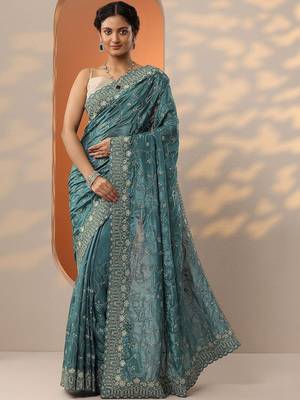 teal embroidered organza saree with unstitched blouse piece 1