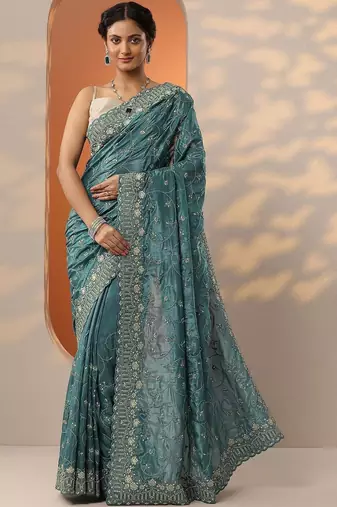 teal embroidered organza saree with unstitched blouse piece