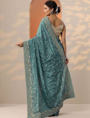 teal embroidered organza saree with unstitched blouse piece 4