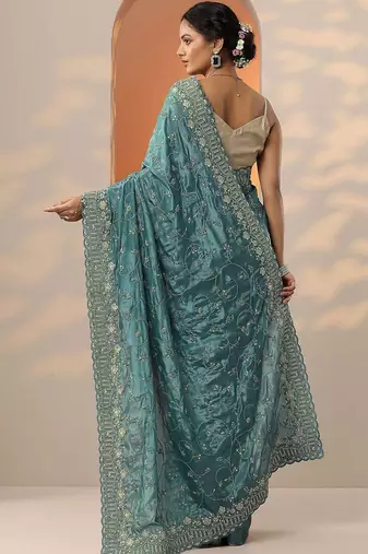 teal embroidered organza saree with unstitched blouse piece