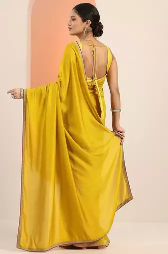 mustard solid saree with unstitched blouse piece
