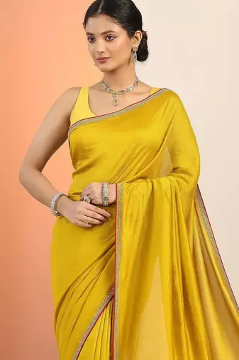 mustard solid saree with unstitched blouse piece