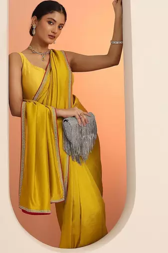 mustard solid saree with unstitched blouse piece