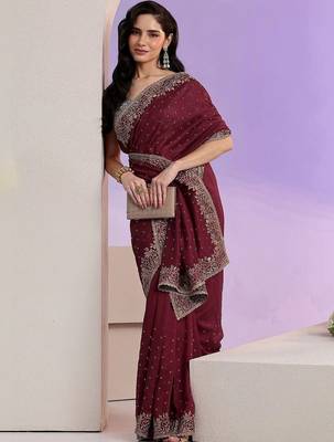 maroon stone work embelllished silk blend saree 1