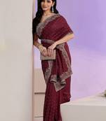 maroon stone work embelllished silk blend saree