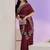 maroon stone work embelllished silk blend saree