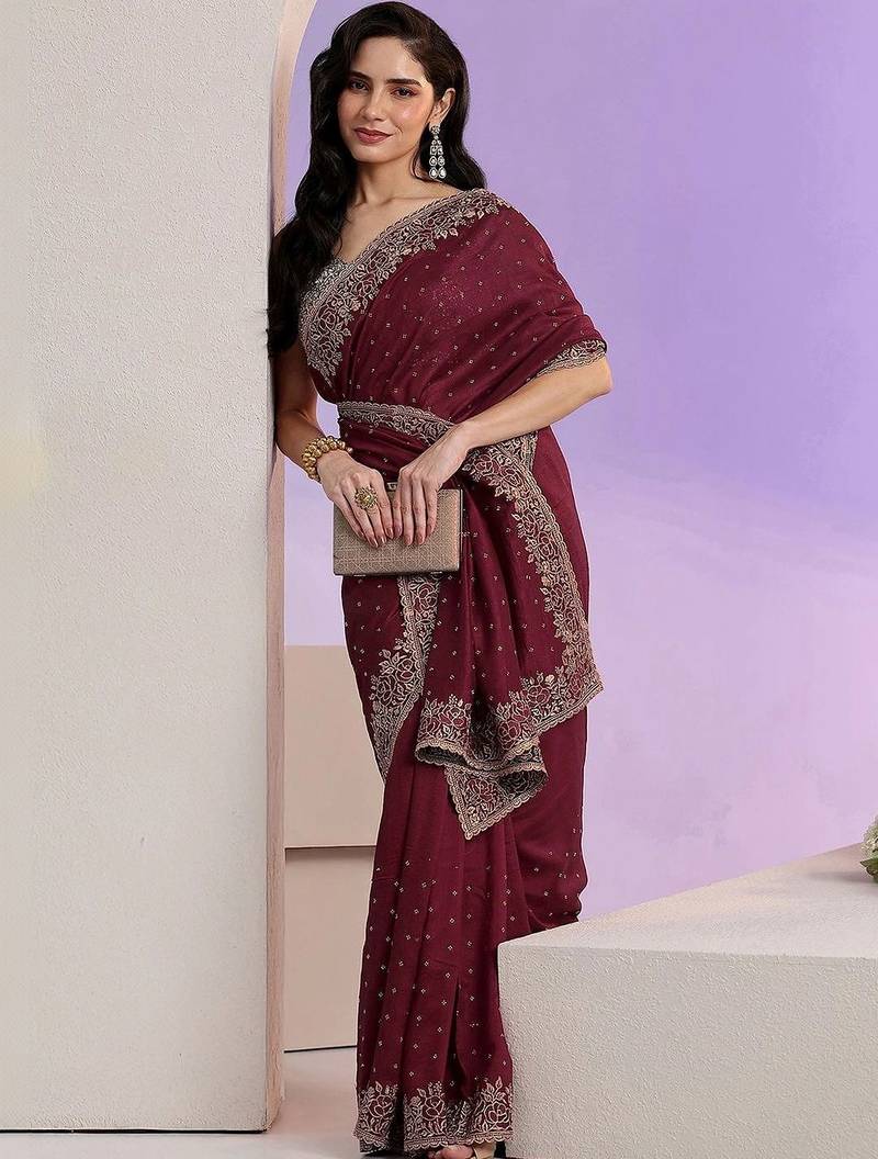 maroon stone work embelllished silk blend saree