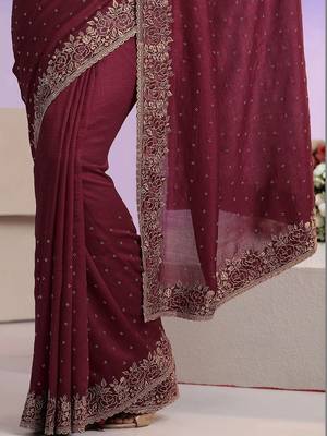 maroon stone work embelllished silk blend saree 2