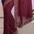 maroon stone work embelllished silk blend saree