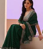 green stone work embelllished silk blend saree