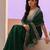 green stone work embelllished silk blend saree