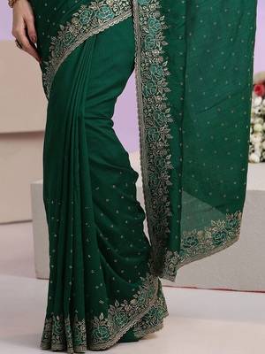 green stone work embelllished silk blend saree 3
