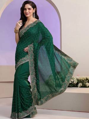 green stone work embelllished silk blend saree 5