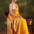 yellow ethnic saree with unstitched blouse piece