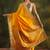 yellow ethnic saree with unstitched blouse piece