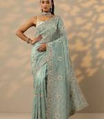 sea green embroidered organza saree with unstitched blouse piece