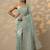 sea green embroidered organza saree with unstitched blouse piece