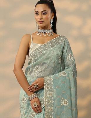 sea green embroidered organza saree with unstitched blouse piece 2