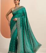 teal embroidered saree with unstitched blouse piece