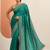 teal embroidered saree with unstitched blouse piece