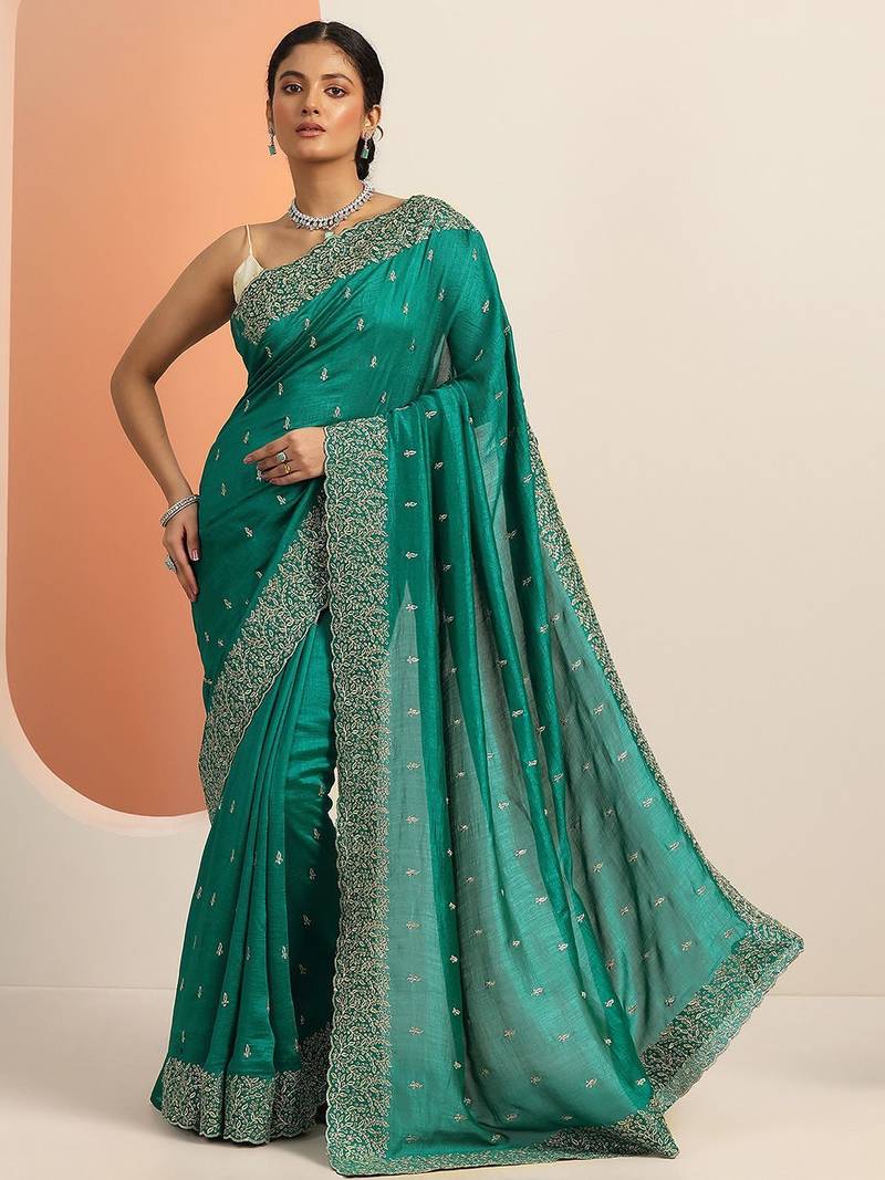 teal embroidered saree with unstitched blouse piece