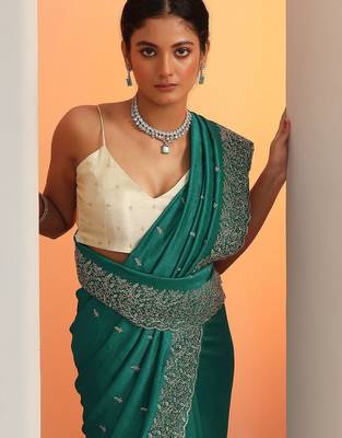 teal embroidered saree with unstitched blouse piece 3