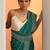 teal embroidered saree with unstitched blouse piece