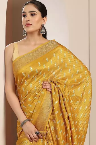 yellow printed saree with unstitched blouse piece