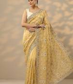 yellow embroidered organza saree with unstitched blouse piece