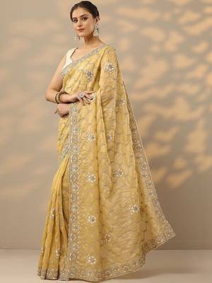 yellow embroidered organza saree with unstitched blouse piece 2