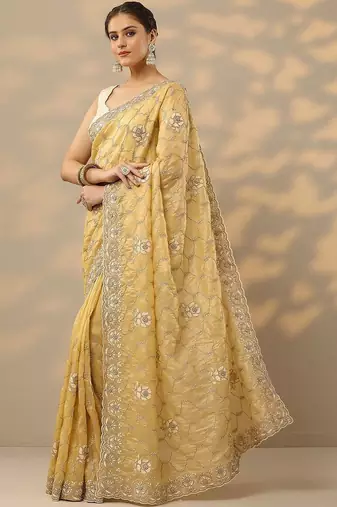yellow embroidered organza saree with unstitched blouse piece