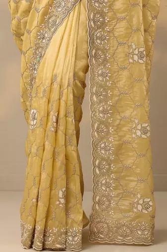 yellow embroidered organza saree with unstitched blouse piece