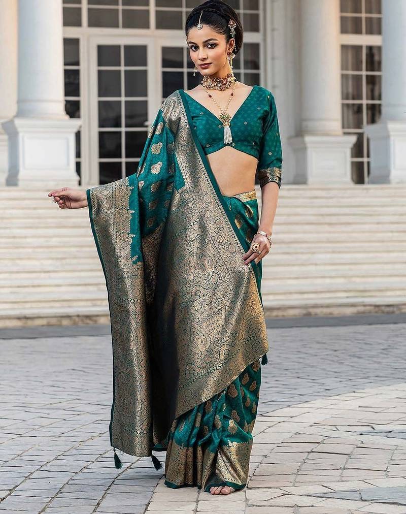 teal woven design saree with unstitched blouse piece