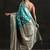 teal woven design saree with unstitched blouse piece