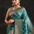 teal woven design saree with unstitched blouse piece
