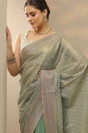 sea green embroidered nylon saree with unstitched blouse piece