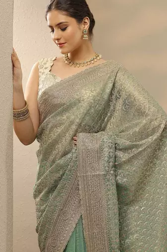 sea green embroidered nylon saree with unstitched blouse piece