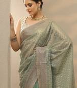 sea green embroidered nylon saree with unstitched blouse piece
