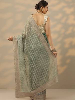 sea green embroidered nylon saree with unstitched blouse piece 4
